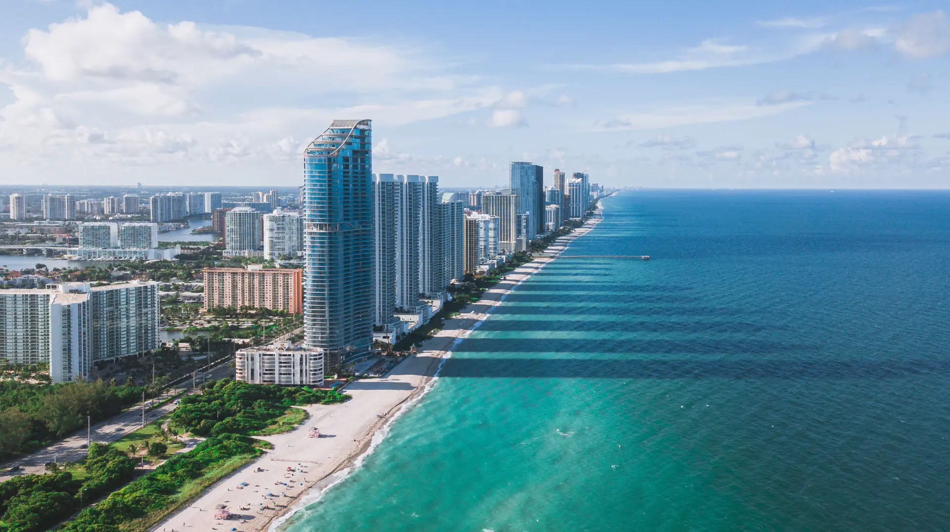 Aerial view of the Miami skyline and Biscayne Bay in bright daylight
